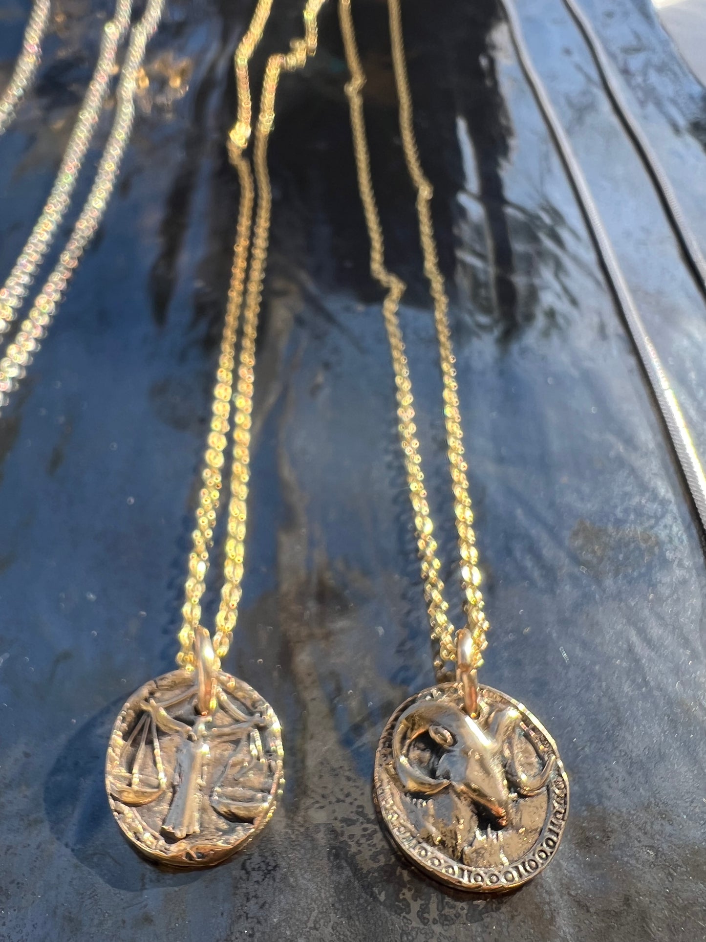 Zodiac charms & chains